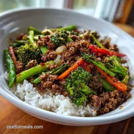 Spicy Ground Beef Stir-Fry Bowl with Garlic Veggies and Steamy Rice in 20 Minutes